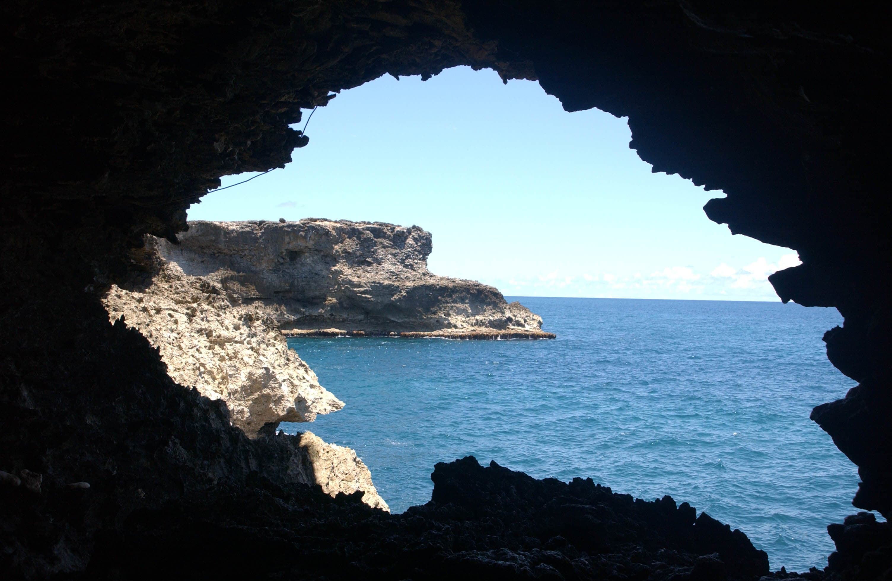 Natural rock windows looking out to the Atlantic from inside Animal Flower Cave, Barbados