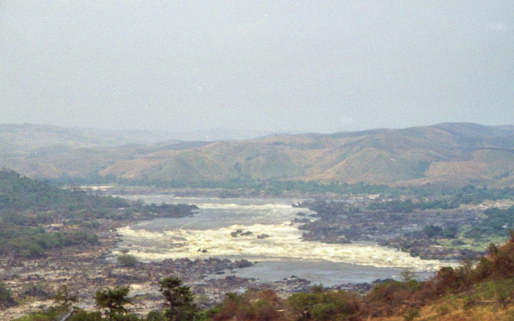 Churning white water rapids of Inga Falls on the Congo River