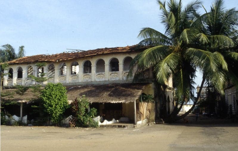 Colourful colonial-era buildings along the seafront in Grand-Bassam