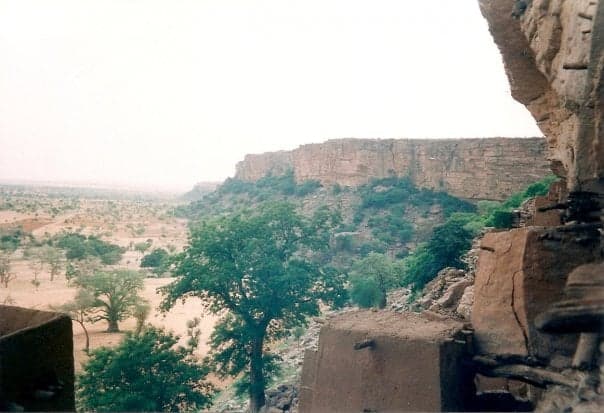 Mud-brick Dogon villages clinging to the face of the Bandiagara cliffs