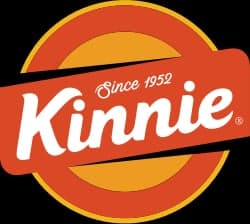A bottle of Maltese Kinnie soft drink poured over ice
