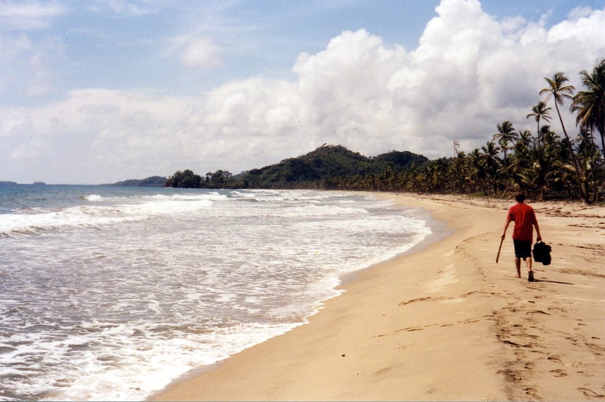 Tiny tropical islands with palm trees in the turquoise sea of Guna Yala