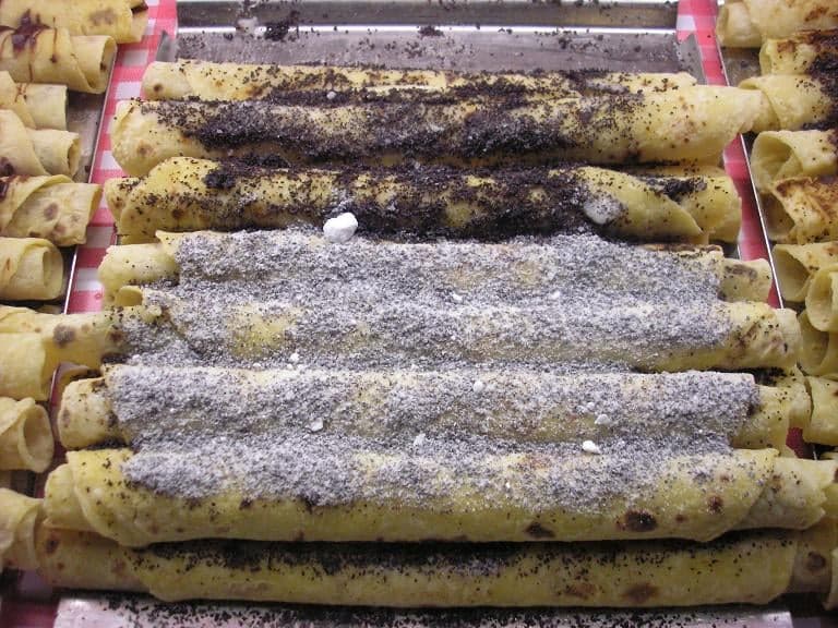 A stack of round flat potato pancakes called lokše