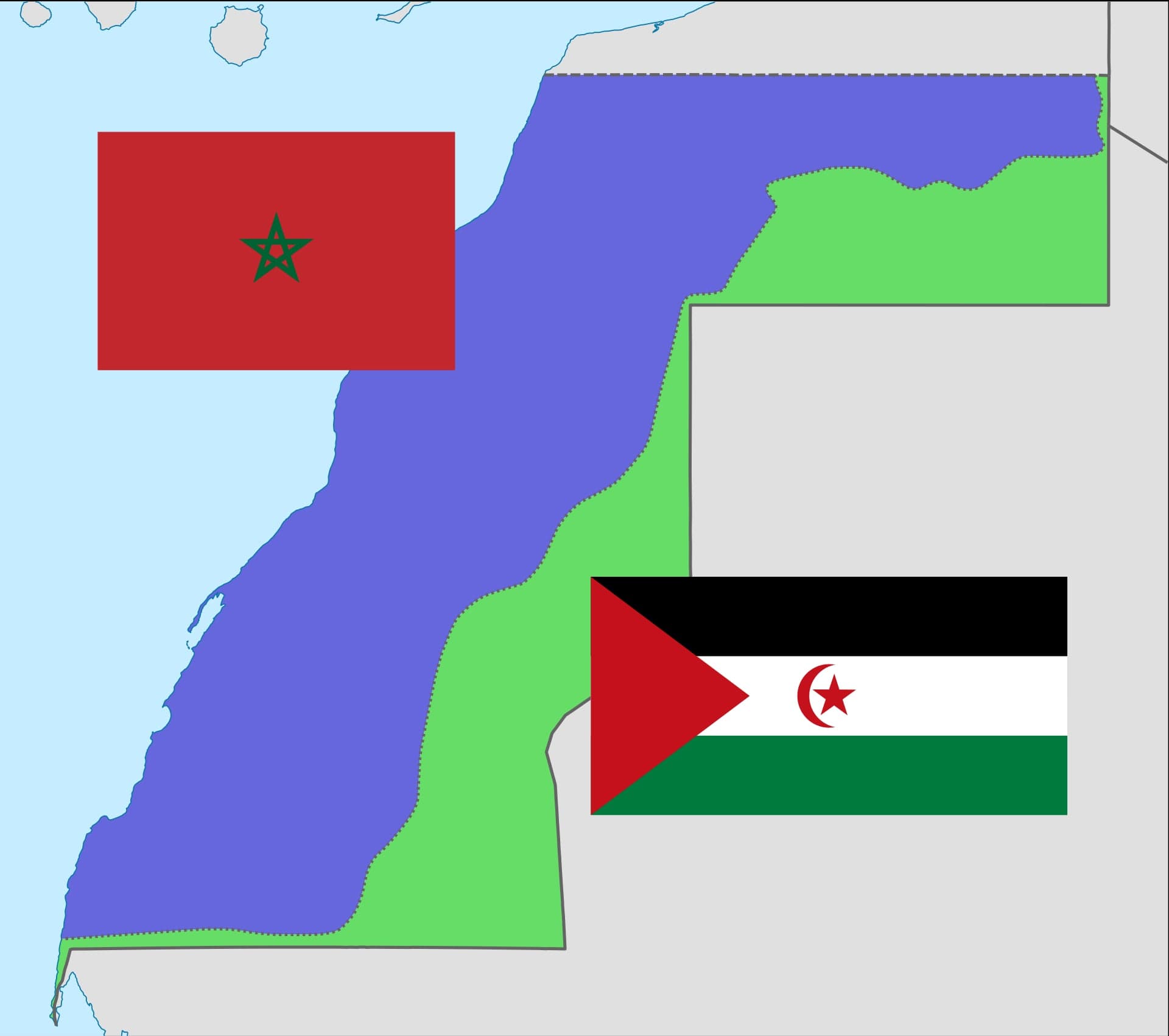A dry riverbed winding through reddish desert landscape in Western Sahara