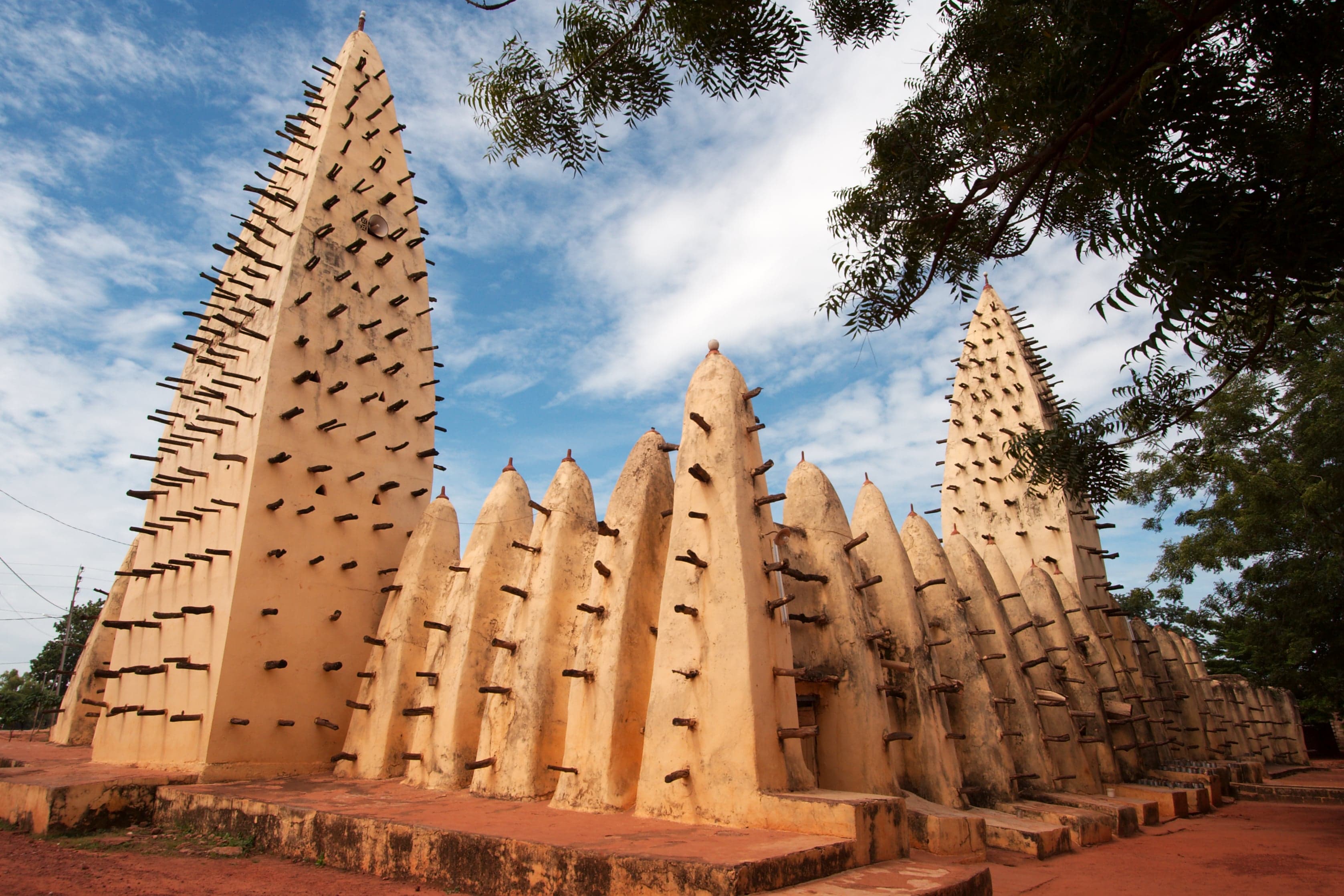 The mud-brick Grand Mosque of Bobo-Dioulasso with wooden poles sticking out of its walls