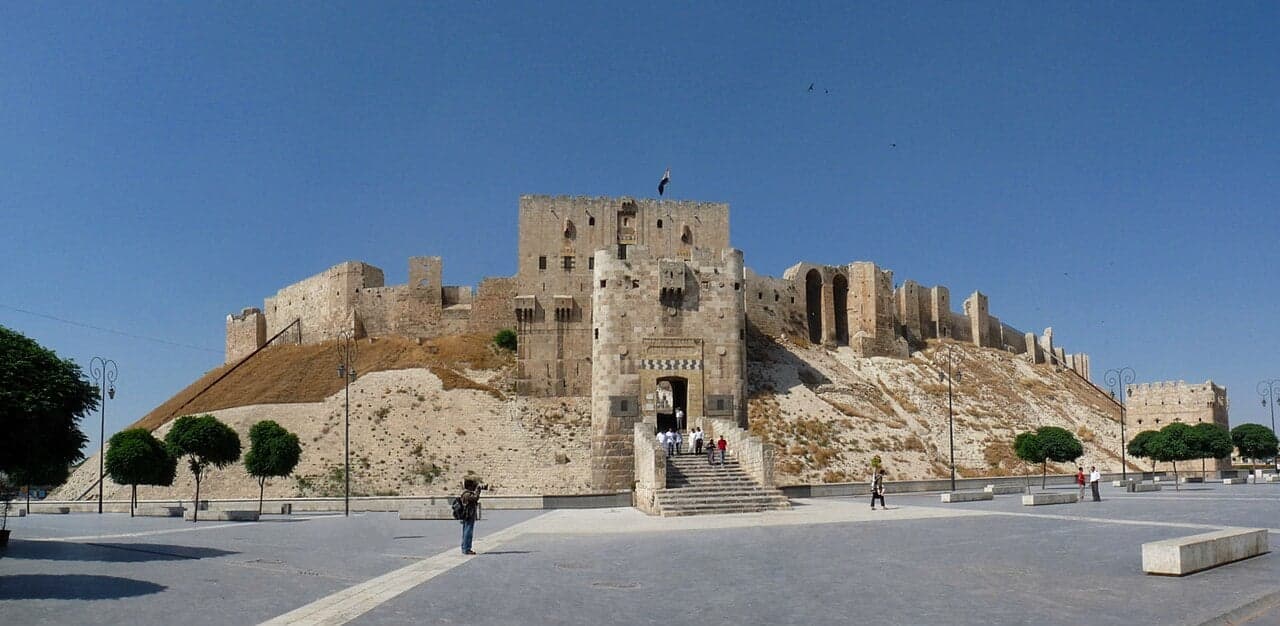 The great hill-top Citadel of Aleppo rising above the old city